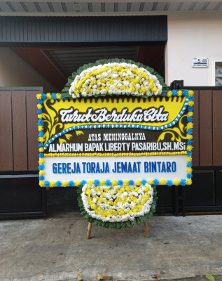 Papan Bunga Duka di Medang